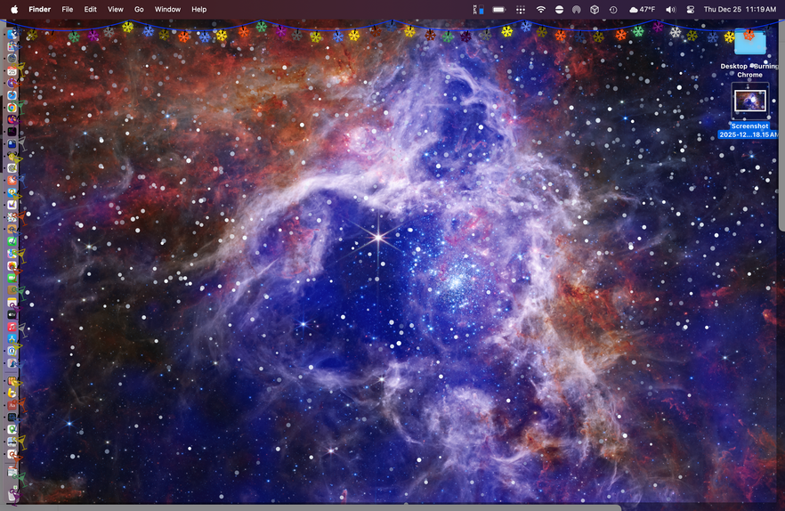 A screen capture of a macOS desktop. The menubar and sidebar have
festive seasonal ornaments from the festivitas app. The background is
a spectacular space shot of a galaxy captured by the James Webb Telescope